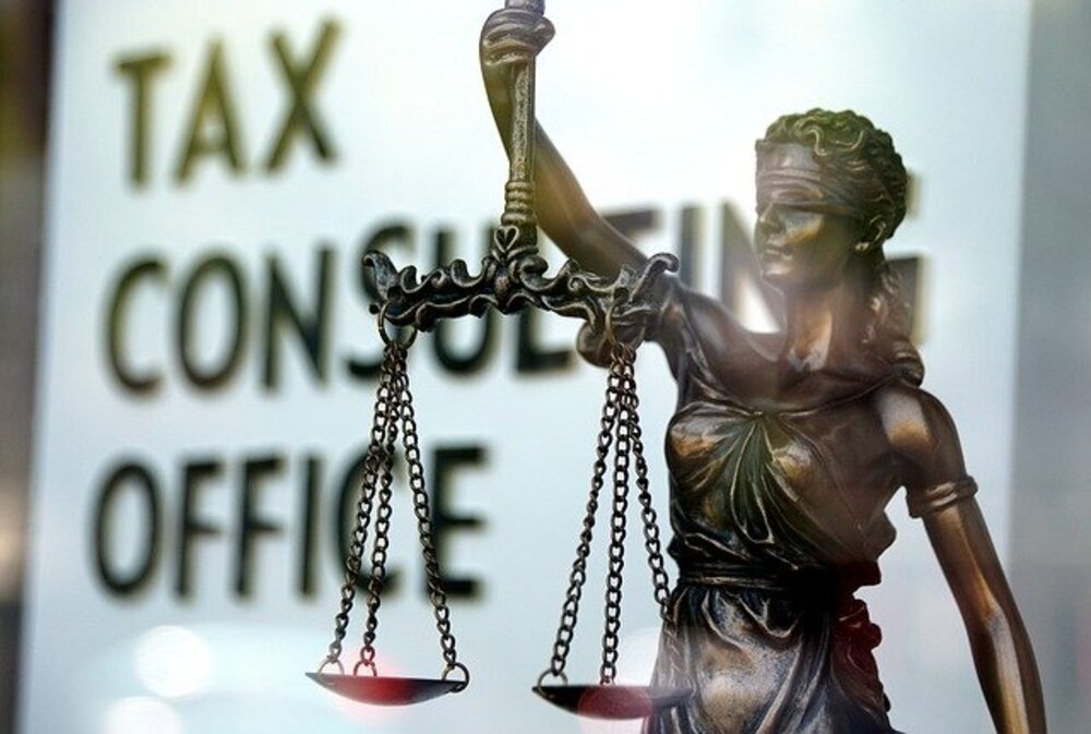 الضريبة بين الواقع والقانون
